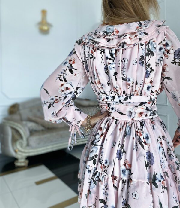 Back view of the Sophia Floral Pink Mini Cocktail Going Out Dress highlighting its elegant floral print and adjustable waistband detail.