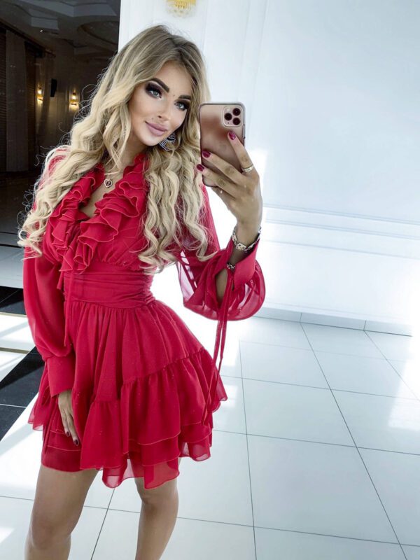 Front view of the Sophia Red Ruffle Short Party Dress, highlighting its bold red color, layered ruffled skirt, and long sleeves with tie details.
